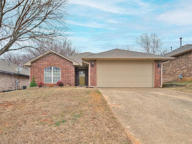 ranch-style house featuring driveway, a shingled roof, an attached garage, a front lawn, and brick siding