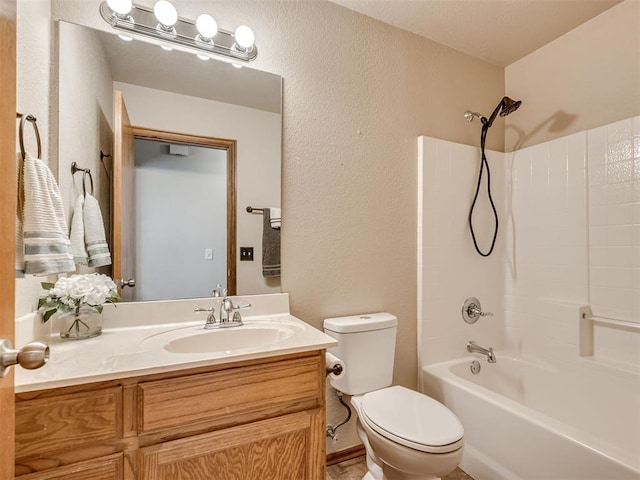 full bath featuring shower / tub combination, a textured wall, vanity, and toilet