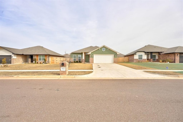 ranch-style home with a front lawn and a garage