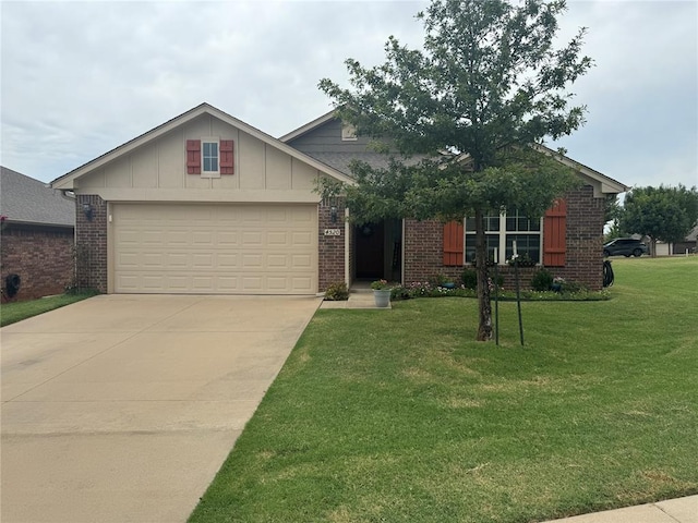 view of front of house featuring a garage and a front yard