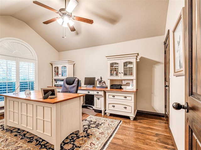 office space with hardwood / wood-style floors, vaulted ceiling, and ceiling fan