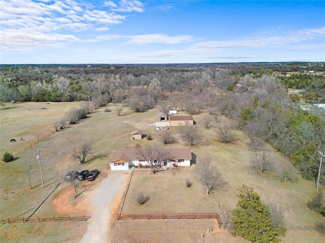 birds eye view of property featuring a rural view