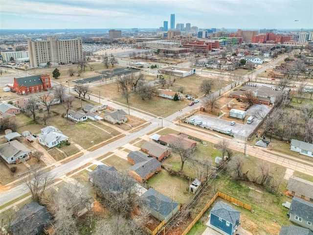 birds eye view of property with a view of city