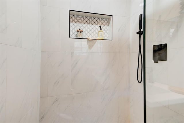 room details with a marble finish shower