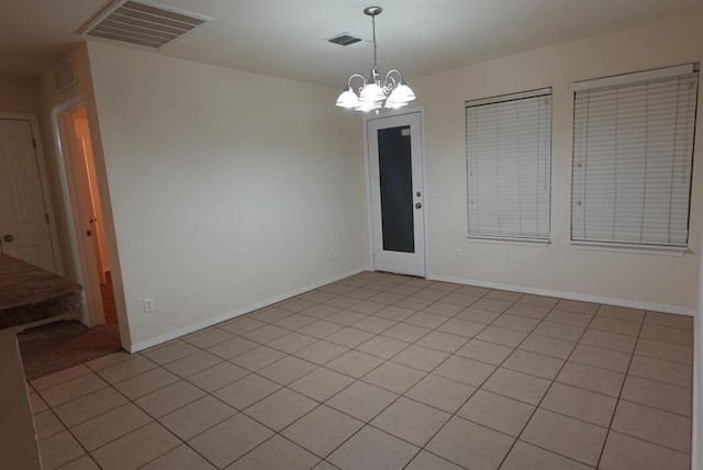 2841 NW 184th Ter, Edmond, OK 73012 - unfurnished dining area with baseboards, visible vents, and an inviting chandelier