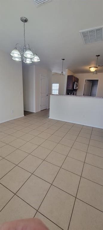 2841 NW 184th Ter, Edmond, OK 73012 - empty room featuring visible vents and light tile patterned flooring