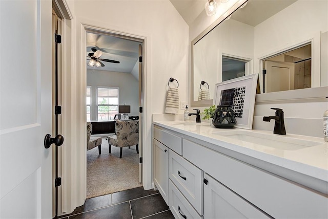 bathroom with ceiling fan, vanity, tile patterned flooring, and lofted ceiling