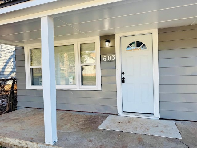 entrance to property with covered porch