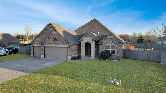 french country inspired facade with brick siding, a front lawn, and fence