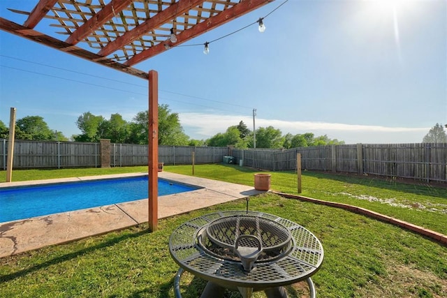4220 Caribou St, Tuttle, OK 73089 - view of swimming pool with a fenced backyard, a pergola, a yard, and a fenced in pool