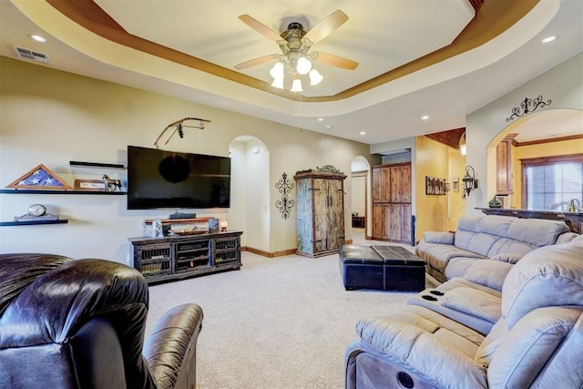 4220 Caribou St, Tuttle, OK 73089 - living room featuring recessed lighting, visible vents, a ceiling fan, arched walkways, and carpet flooring