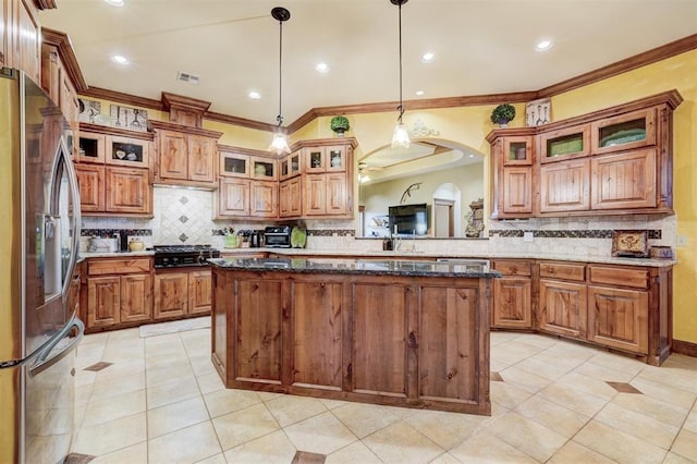 4220 Caribou St, Tuttle, OK 73089 - kitchen featuring light tile patterned flooring, visible vents, stainless steel refrigerator with ice dispenser, and ornamental molding