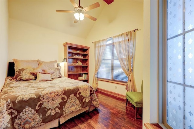 4220 Caribou St, Tuttle, OK 73089 - bedroom with high vaulted ceiling, baseboards, a ceiling fan, and wood finished floors