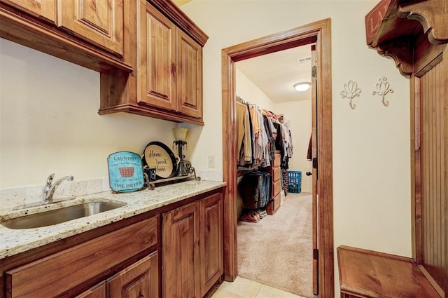 4220 Caribou St, Tuttle, OK 73089 - interior space with light carpet and a sink