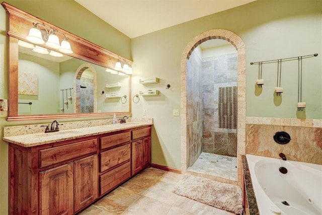 4220 Caribou St, Tuttle, OK 73089 - full bathroom with a tile shower, double vanity, a tub with jets, and a sink