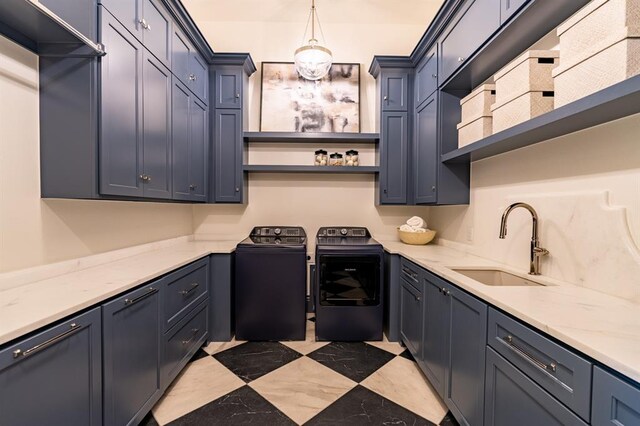 20945 Alba Ct, Edmond, OK 73012 - washroom with washer and dryer and cabinet space