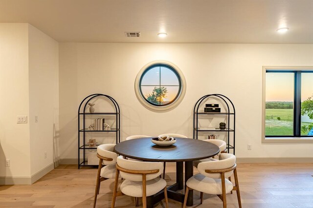 20945 Alba Ct, Edmond, OK 73012 - dining space featuring light wood finished floors, baseboards, and recessed lighting