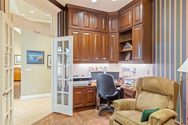 office space with light wood finished floors, recessed lighting, baseboards, and french doors