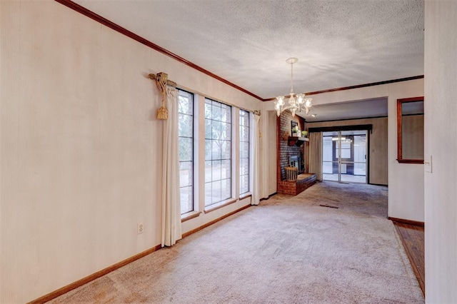 unfurnished dining area featuring a fireplace, baseboards, a textured ceiling, and carpet flooring