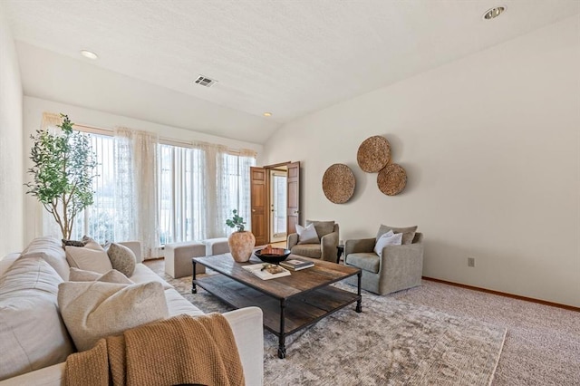 living area with recessed lighting, light carpet, visible vents, baseboards, and vaulted ceiling