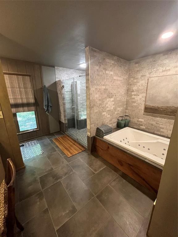 bathroom featuring plus walk in shower