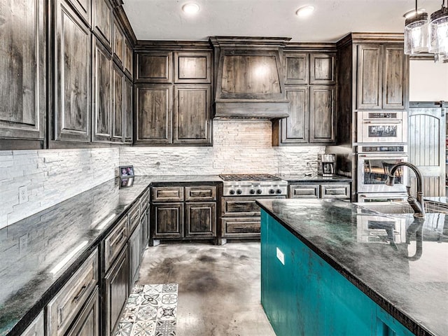 912 Ash NE, Piedmont, OK 73078 - kitchen with decorative light fixtures, dark brown cabinets, and custom exhaust hood
