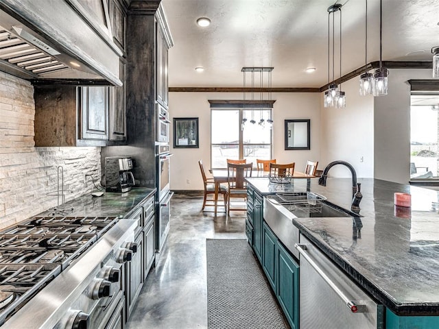 912 Ash NE, Piedmont, OK 73078 - kitchen with stainless steel appliances, a sink, hanging light fixtures, a large island, and custom range hood