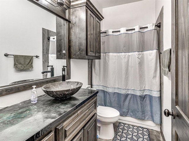 912 Ash NE, Piedmont, OK 73078 - bathroom with tile patterned flooring, vanity, and toilet