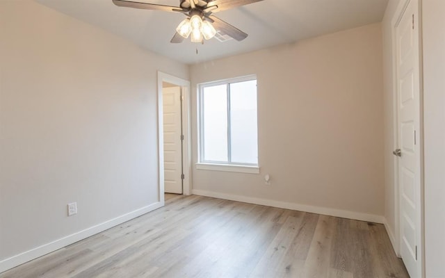 unfurnished bedroom featuring light wood-type flooring and ceiling fan