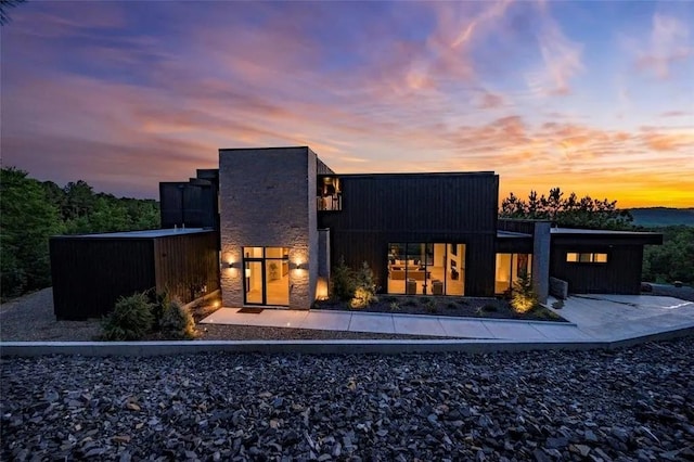 back of property with a patio and central air condition unit