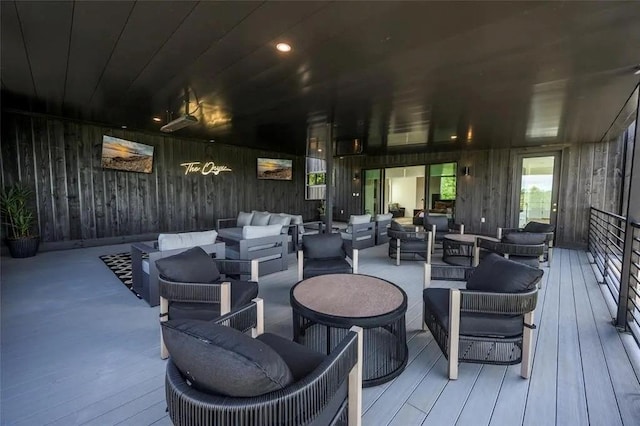 wooden deck with outdoor lounge area