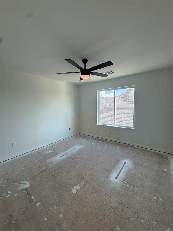 12804 Cobblestone Curve Rd, Oklahoma City, OK 73142 - empty room with a ceiling fan and baseboards