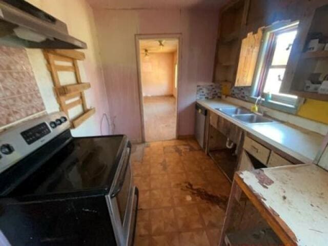 kitchen featuring stainless steel appliances and sink