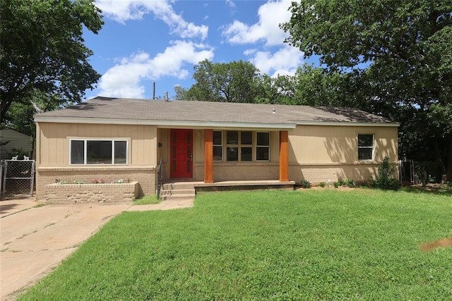 3805 SE 26th St, Del City, OK 73115 - ranch-style home featuring brick siding, covered porch, and roof with shingles