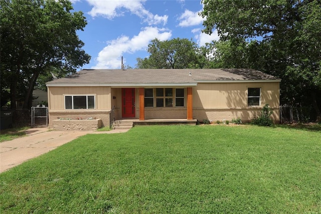 3805 SE 26th St, Del City, OK 73115 - view of front of house featuring brick siding, a shingled roof, and a gate
