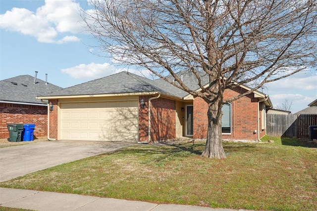 ranch-style home featuring a garage, fence, and brick siding