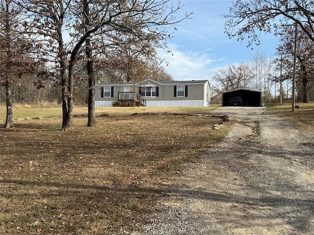 manufactured / mobile home with a carport