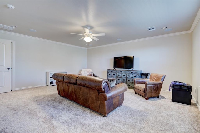 living room featuring visible vents, crown molding, carpet flooring, and ceiling fan