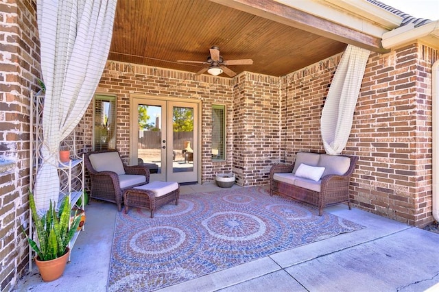 view of patio featuring ceiling fan and french doors