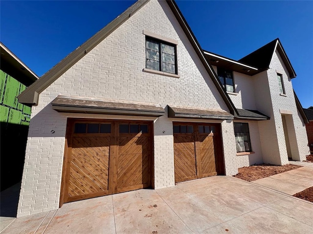 exterior space featuring driveway