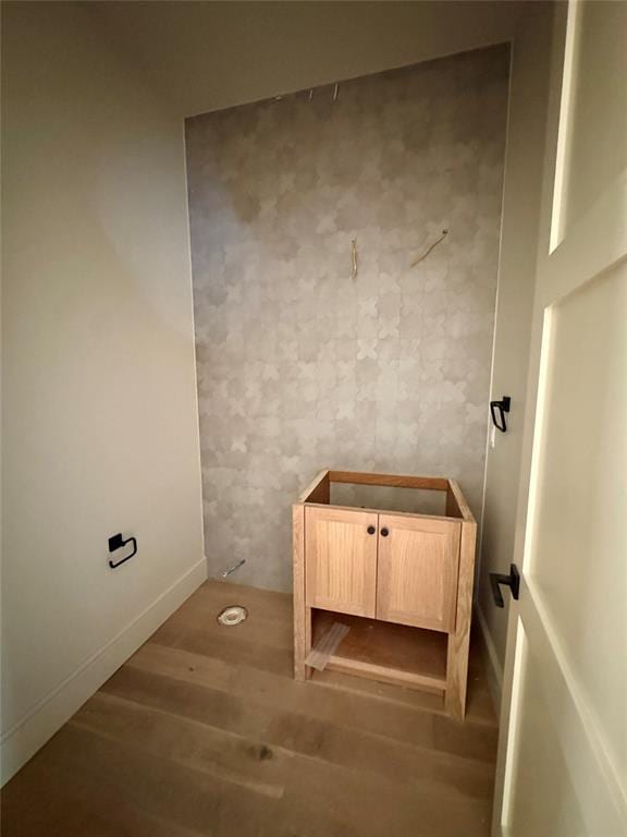 bathroom featuring wood finished floors