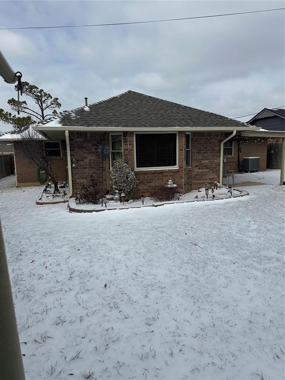 view of front of house with cooling unit