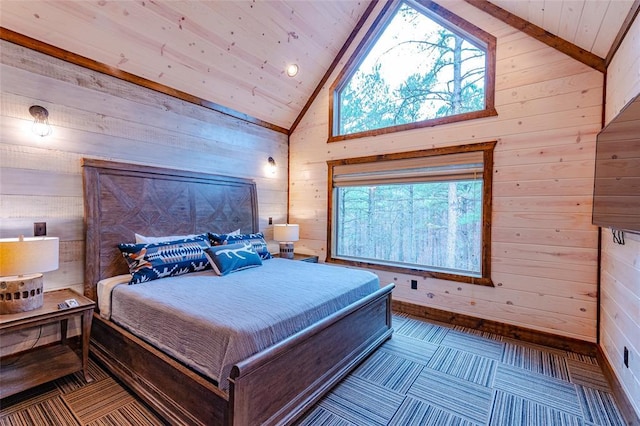 bedroom with high vaulted ceiling, wood ceiling, and wooden walls