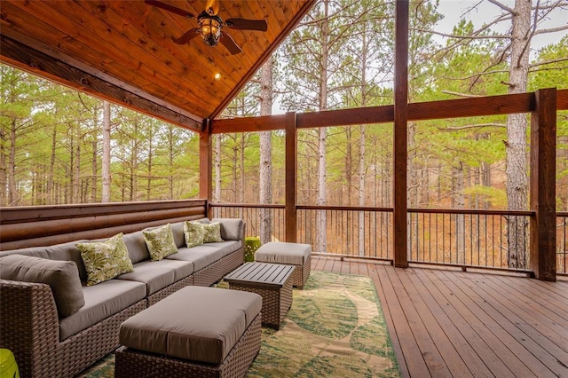 sunroom featuring wood ceiling, vaulted ceiling, and ceiling fan