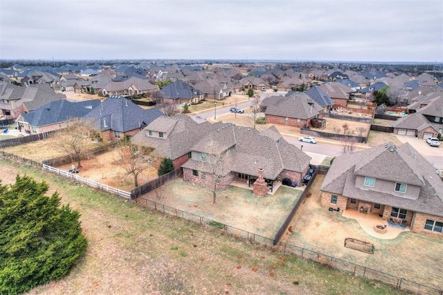 birds eye view of property with a residential view