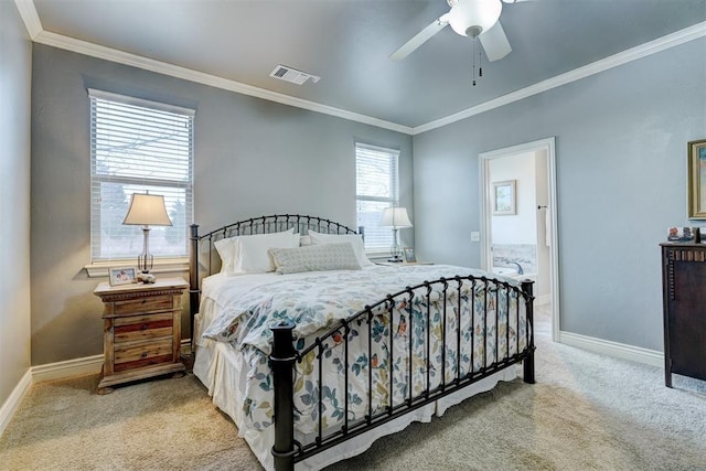 carpeted bedroom featuring visible vents, baseboards, ceiling fan, and ornamental molding