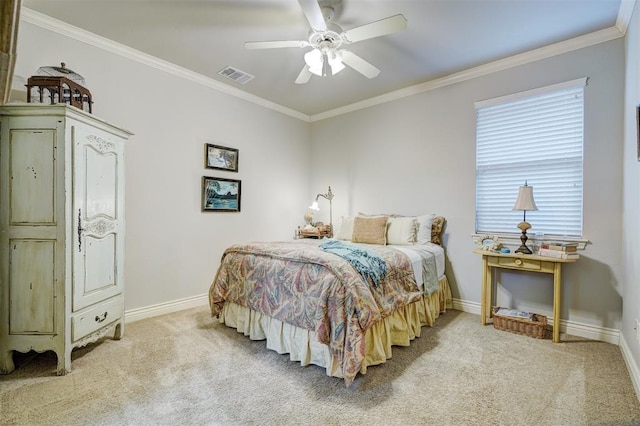 bedroom featuring baseboards, crown molding, and light colored carpet