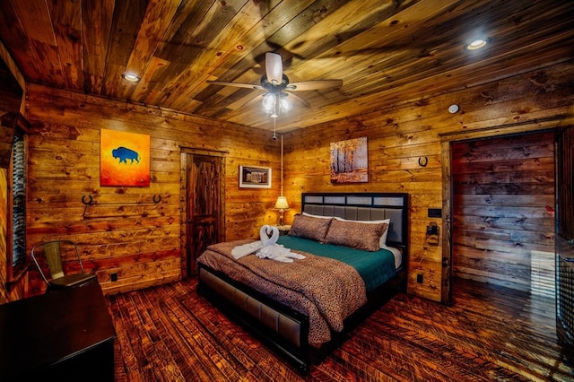 bedroom featuring wooden ceiling, wooden walls, dark wood-type flooring, and recessed lighting