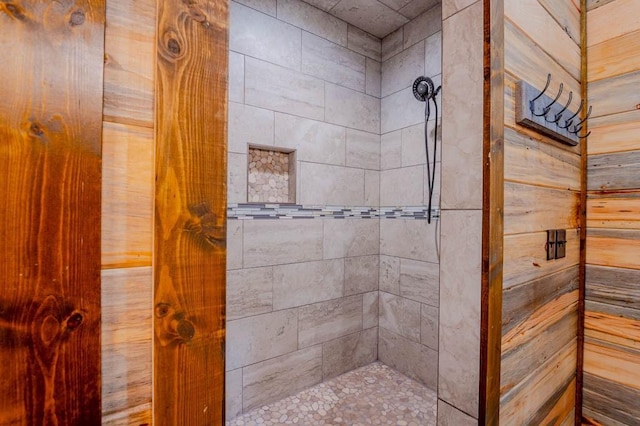 full bathroom with tiled shower