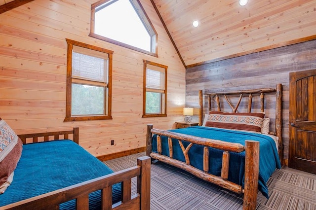 carpeted bedroom featuring high vaulted ceiling, wooden ceiling, and wooden walls